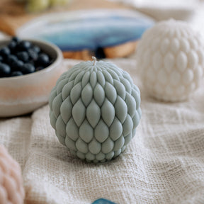 Knotenkunst Kerze Oval in Pastell